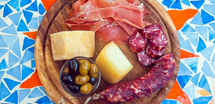 Sardinian Specialties include Cheese & Charcuterie, Bottarga, Honey, Biscuits, Sardinian Wine, Myrtle Liquor. Teulada, Sardinia, Italy. Copyright © 2022 Terence Carter / Grantourismo. All Rights Reserved.