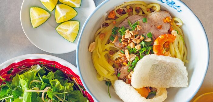 Hoi An Specialties – Delicious Hoi An Dishes You Have to Try. My Quang, Hoi An, Vietnam. Copyright © 2022 Terence Carter / Grantourismo. All Rights Reserved.