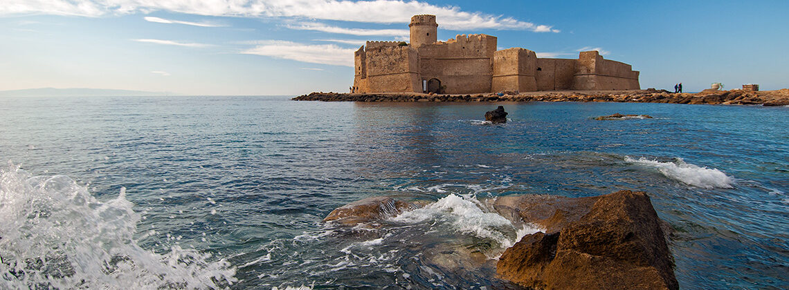 Calabria Itineraries for Exploring this Undiscovered Italian Region. Le Castella: a splendid Norman castle that appears to float at sea, Capo Rizzuto, Crotone, Calabria, Italy. Copyright © 2022 Terence Carter / Grantourismo. All Rights Reserved.