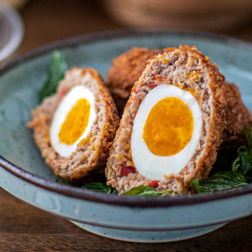 Traditional Scotch Eggs Recipe with Thai Inspired Pad Kra Pao Twist. British comfort food recipes. Copyright © 2022 Terence Carter / Grantourismo. All Rights Reserved.