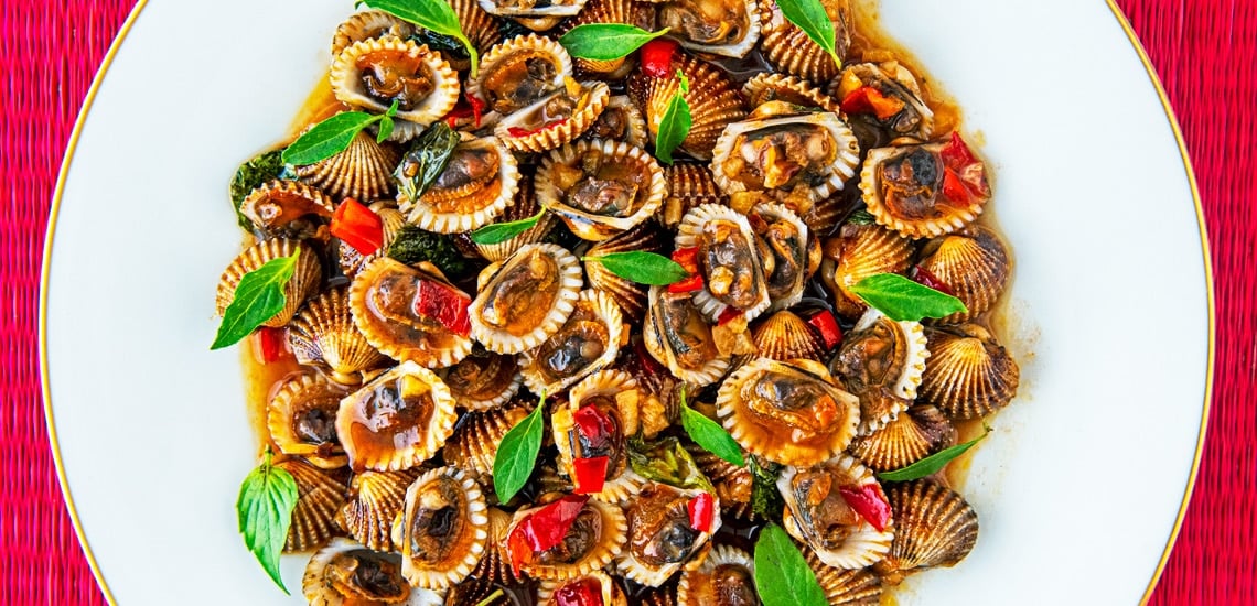 Cambodian Stir Fried Clams with Ripe Tamarind, Chilli, Garlic and Basil. 22 recipes to cook in 2022. Copyright © 2022 Terence Carter / Grantourismo. All Rights Reserved.