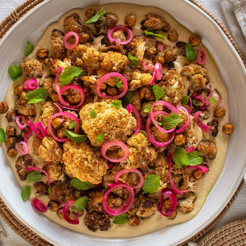 Roasted Cauliflower Recipe with Creamy Hummus, Crispy Chickpeas, Pickled Shallots and Mint. Best chickpea recipes. Copyright © 2022 Terence Carter / Grantourismo. All Rights Reserved.