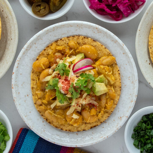 White Chicken Chilli Tostadas Recipe for a Quick and Easy Weeknight Meal. Copyright © 2023 Terence Carter / Grantourismo. All Rights Reserved.