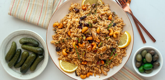 Middle Eastern Rice Recipe with Spices, Pistachios, Cashews and Raisins. Most popular April recipes.