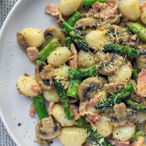 Gnocchi with Asparagus and Mushrooms, Bacon and Parmesan Recipe. Copyright © 2024 Terence Carter / Grantourismo. All Rights Reserved.