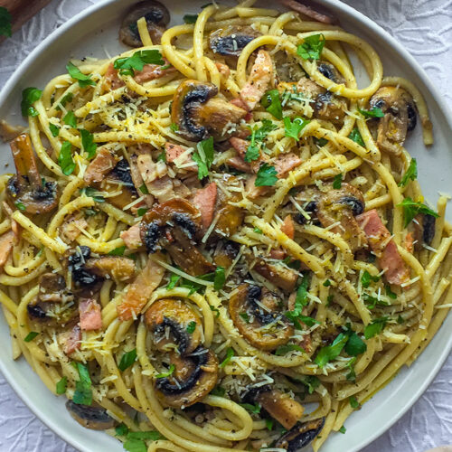 Bacon Mushroom Pasta Recipe with Parmigiano, Fresh Parsley and Bucatini. Copyright © 2024 Terence Carter / Grantourismo. All Rights Reserved.