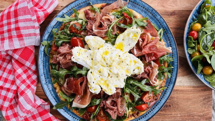 Burrata Pizza Recipe with Prosciutto, Rucola and Cherry Tomatoes. Copyright Grantourismo 2025 Terence Carter Lara Dunston
